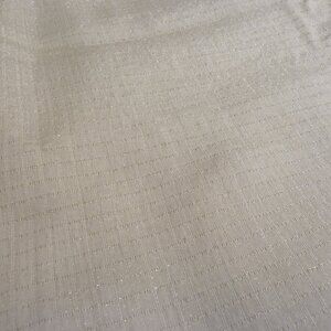 Sand-colored chiffon fabric with interwoven gold threads Silk and nylon